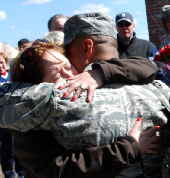 Security Forces from the 439th Airlift Wing were greeted by almost 100 family and fellow reservists as they came home from a 180-day-tour in Afghanistan. Their bus was escorted to the teary-eyed and enthusiastic crowd near the Security Forces building at Westover by the Chicopee Police Department. (US Air Force photo/Master Sgt. Andrew Biscoe)
