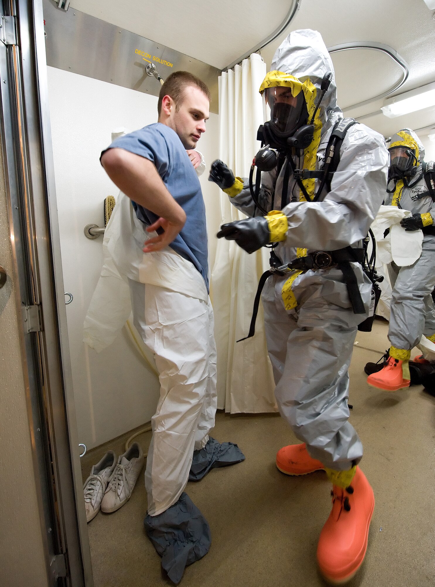 24 Mar 2011  USAF Photo by Jason Minto
Base exercise behind bldg 639  A1C Steven Baker 736 AMXS going through the decon station that the Little Creek Fire Fighters brought for the MARE.
 (U.S. Air Force photo by Jason Minto/Unreleased)