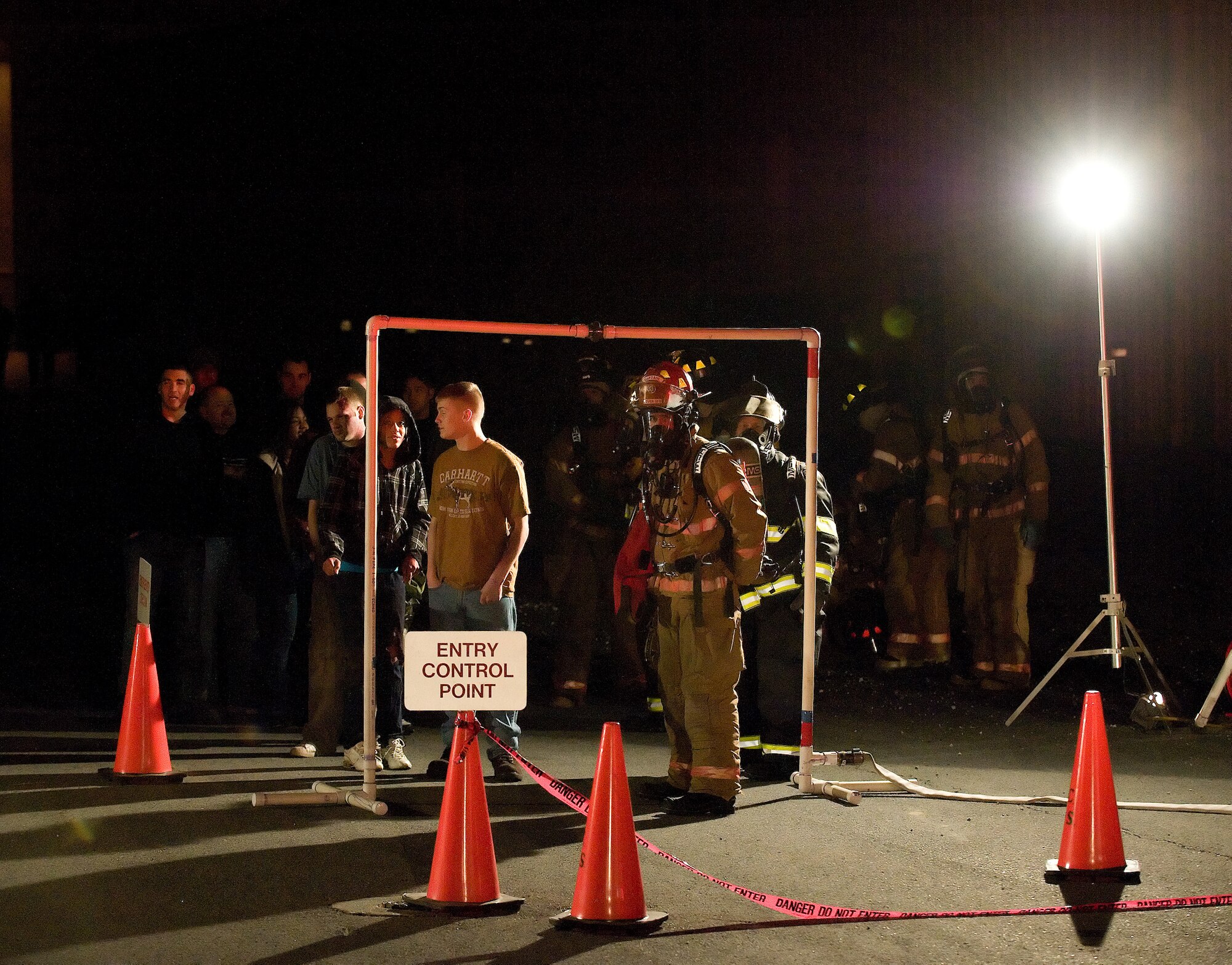 24 Mar 2011  USAF Photo by Jason Minto
Base exercise behind bldg 639.  Victims waiting to proceed through the decon station.
 (U.S. Air Force photo by Jason Minto/Unreleased)
