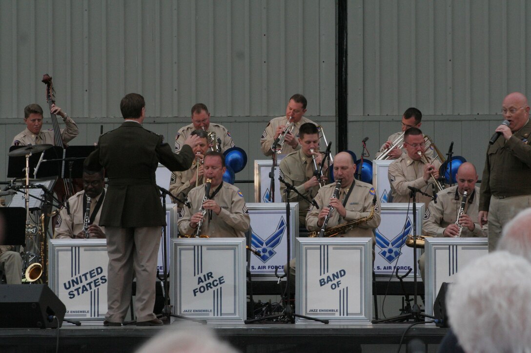 Tom Daugherty Pfrogner leads Band of Flight's Night Flight at the annual Glenn Miller concert on grounds of National Museum of the United States Air Force.