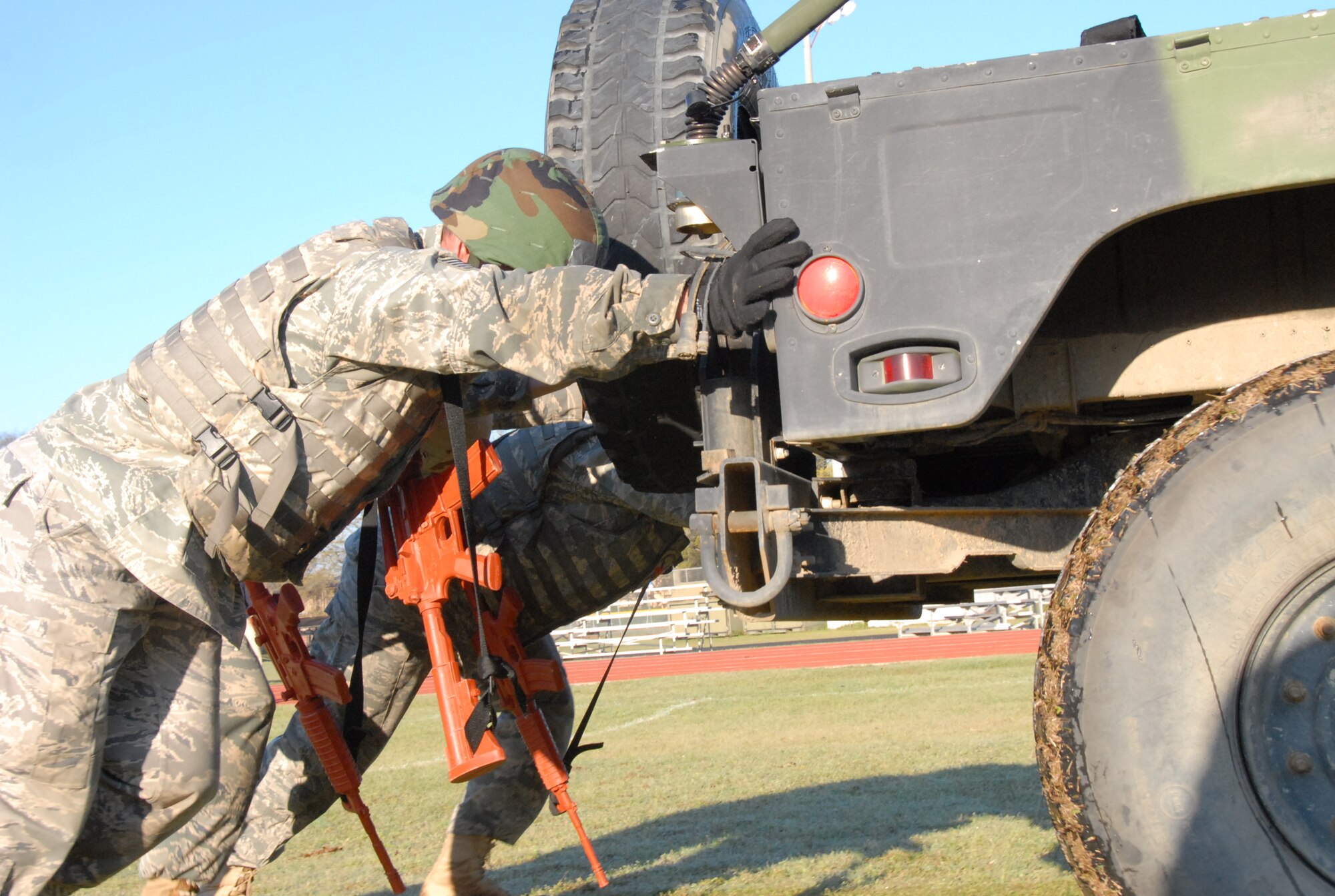 Airmen participate in the first Military Challenge here, an event to give Airmen a chance to prove they are up to some of the real-world physical challenges they might face on deployment. U.S. Air Force Photo by Wayne Crenshaw
