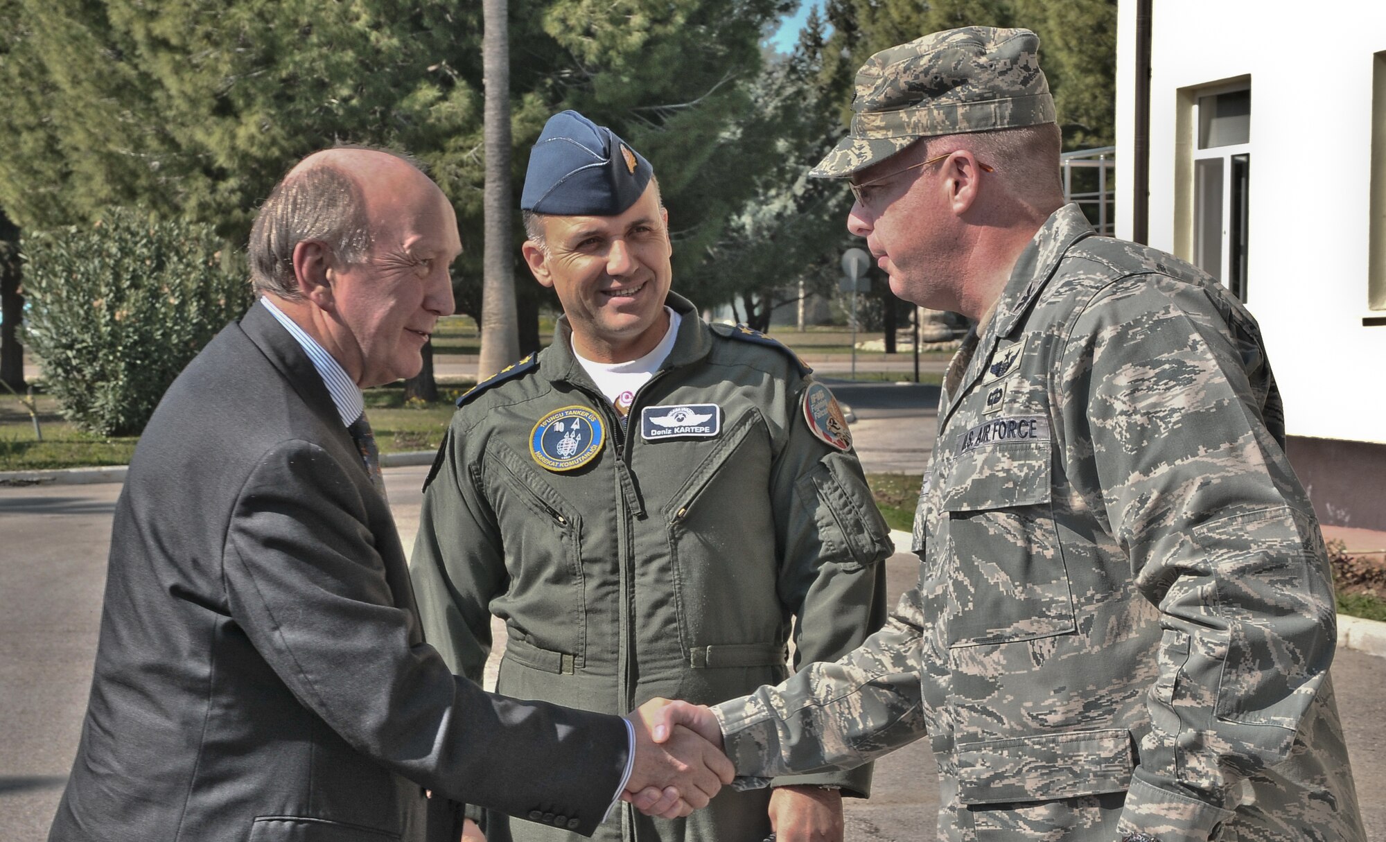 David Reddaway, the British ambassador to Turkey, is greeted by Col. Eric Beene, the 39th Air Base Wing commander, during a visit to Incirlik Air Base, Turkey March 16, 2011. During his visit, Ambassador Reddaway had an office call with the commander of the Turkish 10th Tanker Command and received a base tour to learn more about the missions of the 10th Tanker Command and the 39th Air Base Wing, and how the units work together, officials said. Also pictured is Col. Deniz Kartepe, the commander of the 10th Tanker Command. (U.S. Air Force photo by Staff Sgt. Alexandre Montes/Released)