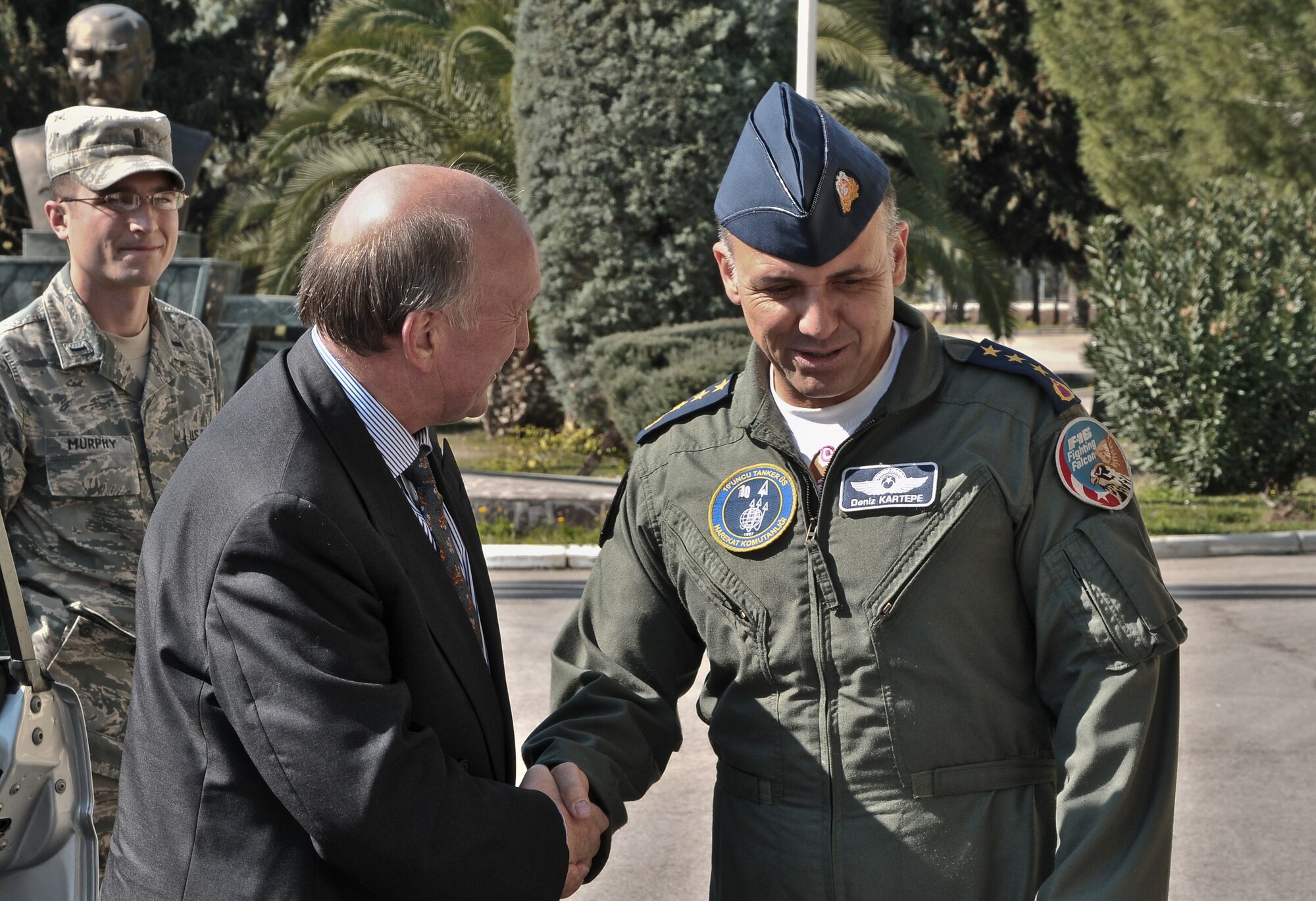 David Reddaway, the British ambassador to Turkey, is greeted by Col. Deniz Kartepe, the commander of the Turkish 10th Tanker Command, during a recent visit to Incirlik Air Base, Turkey, March 16, 2011. During his visit, Ambassador Reddaway had an office call with Colonel Kartepe and received a base tour to learn more about the missions of the 10th Tanker Command and the 39th Air Base Wing, and how the units work together, officials said. Also pictured is 1st Lt. Jonathan Murphy, from the 39th Air Base Wing protocol office. (U.S. Air Force photo by Staff Sgt. Alexandre Montes/Released)