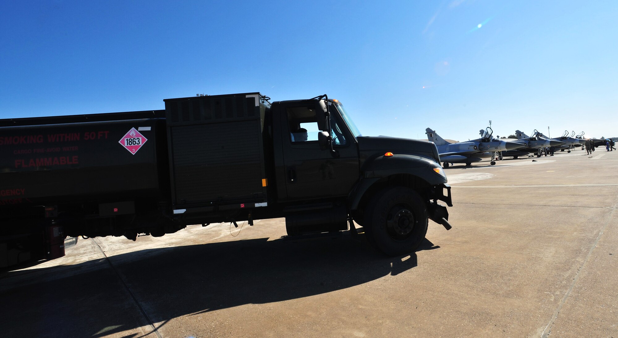 Qatari air force pilots complete post-flight checks during their stop at Incirlik Air Base, Turkey, to refuel in support of Operation Odyssey Dawn March 25, 2011. Joint Task Force Odyssey Dawn is the U.S. Africa Command task force established to provide operational and tactical command and control of U.S. military forces supporting the international response to the unrest in Libya and enforcement of United Nations Security Council Resolution 1973. UNSCR 1973 authorized all necessary measures to protect civilians in Libya under threat of attack by Qadhafi regime forces. JTF Odyssey Dawn is commanded by U.S. Navy Admiral Samuel J. Locklear, III. (U.S. Air Force photo by Staff Sgt. Alexandre Montes)