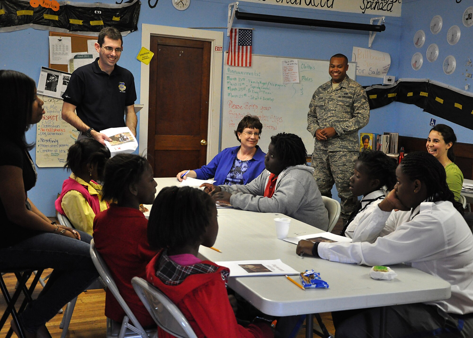 Members from the 315th Airlift Wing Public Affairs office here took time to step from behind the camera and take to the classroom sharing their knowledge and passion for photography with children who participate in an educational partnership between Metanoia and Safe Kids USA at Saint Mathews Church in North Charleston, S.C. March 14. (U.S. Air Force photo by Senior Airman Bobby Pilch)