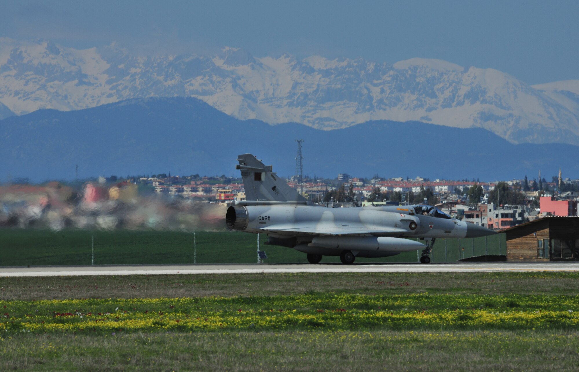 A Qatari Mirage F-1 jet drives down the runway to refuel in support of Operation Odyssey Dawn March 25, 2011, at Incirlik Air Base, Turkey.  Joint Task Force Odyssey Dawn is the U.S. Africa Command task force established to provide operational and tactical command and control of U.S. military forces supporting the international response to the unrest in Libya and enforcement of United Nations Security Council Resolution 1973. UNSCR 1973 authorized all necessary measures to protect civilians in Libya under threat of attack by Qadhafi regime forces. JTF Odyssey Dawn is commanded by U.S. Navy Admiral Samuel J. Locklear, III. (U.S. Air Force photo by Staff Sgt. Alexandre Montes)