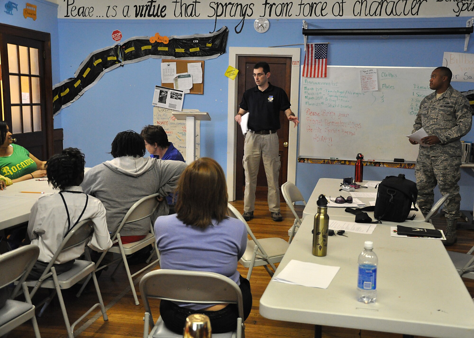 Members from the 315th Airlift Wing Public Affairs office here took time to step from behind the camera and take to the classroom sharing their knowledge and passion for photography with children who participate in an educational partnership between Metanoia and Safe Kids USA at Saint Mathews Church in North Charleston, S.C. March 14. (U.S. Air Force photo by Senior Airman Bobby Pilch)