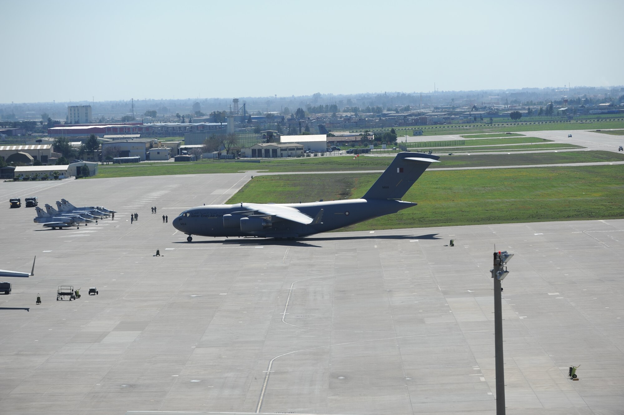 A C-17 and four Mirage F-1s from Qatar arrive March 25, 2011, at Incirlik Air Base, Turkey to refuel in support of Operation Odyssey Dawn.  Joint Task Force Odyssey Dawn is the U.S. Africa Command task force established to provide operational and tactical command and control of U.S. military forces supporting the international response to the unrest in Libya and enforcement of United Nations Security Council Resolution 1973. UNSCR 1973 authorized all necessary measures to protect civilians in Libya under threat of attack by Qadhafi regime forces. JTF Odyssey Dawn is commanded by U.S. Navy Admiral Samuel J. Locklear, III. (U.S. Air Force photo by Airman 1st Class Clayton Lenhardt)