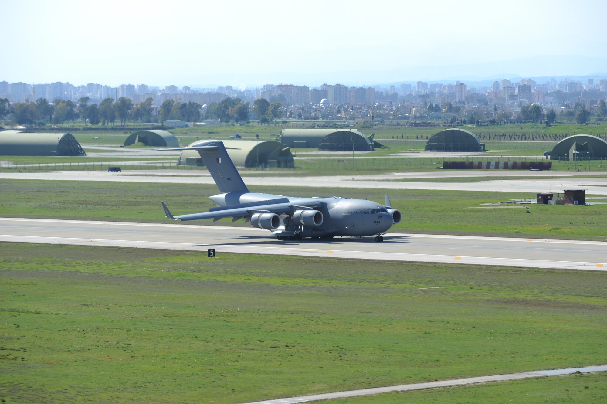 A Qatari C-17 taxies down the runway March 25, 2011, at Incirlik Air Base, Turkey to refuel in support of Operation Odyssey Dawn.  Joint Task Force Odyssey Dawn is the U.S. Africa Command task force established to provide operational and tactical command and control of U.S. military forces supporting the international response to the unrest in Libya and enforcement of United Nations Security Council Resolution 1973. UNSCR 1973 authorized all necessary measures to protect civilians in Libya under threat of attack by Qadhafi regime forces. JTF Odyssey Dawn is commanded by U.S. Navy Admiral Samuel J. Locklear, III. (U.S. Air Force photo by Airman 1st Class Clayton Lenhardt)