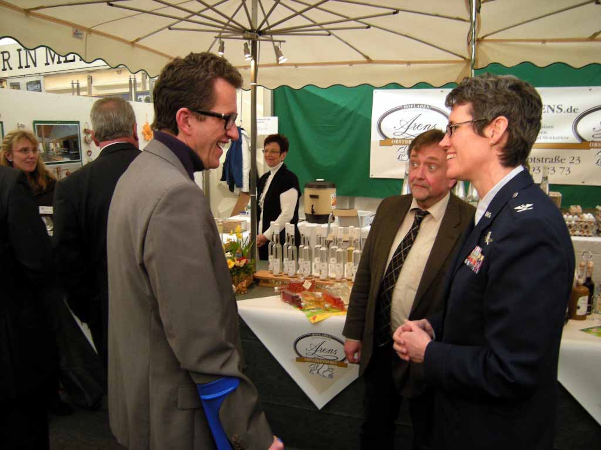 BITBURG, Germany – Col. Jodine Tooke, 52nd Mission Support Group commander, greets Dr. Joachim Streit, county commissioner of Eifel county Bitburg-Pruem, at the 32nd Bitburg Beda market March 18 in Bitburg, Germany. The Beda market’s theme this year was “Looking, Exploring, Informing” and drew more than 80,000 people from all around the region and the neighboring countries of Luxembourg and Belgium. This event presented both the economical and cultural life of the Eifel-Pruem region in various spots throughout the city. (U.S. Air Force photo/Iris Reiff)