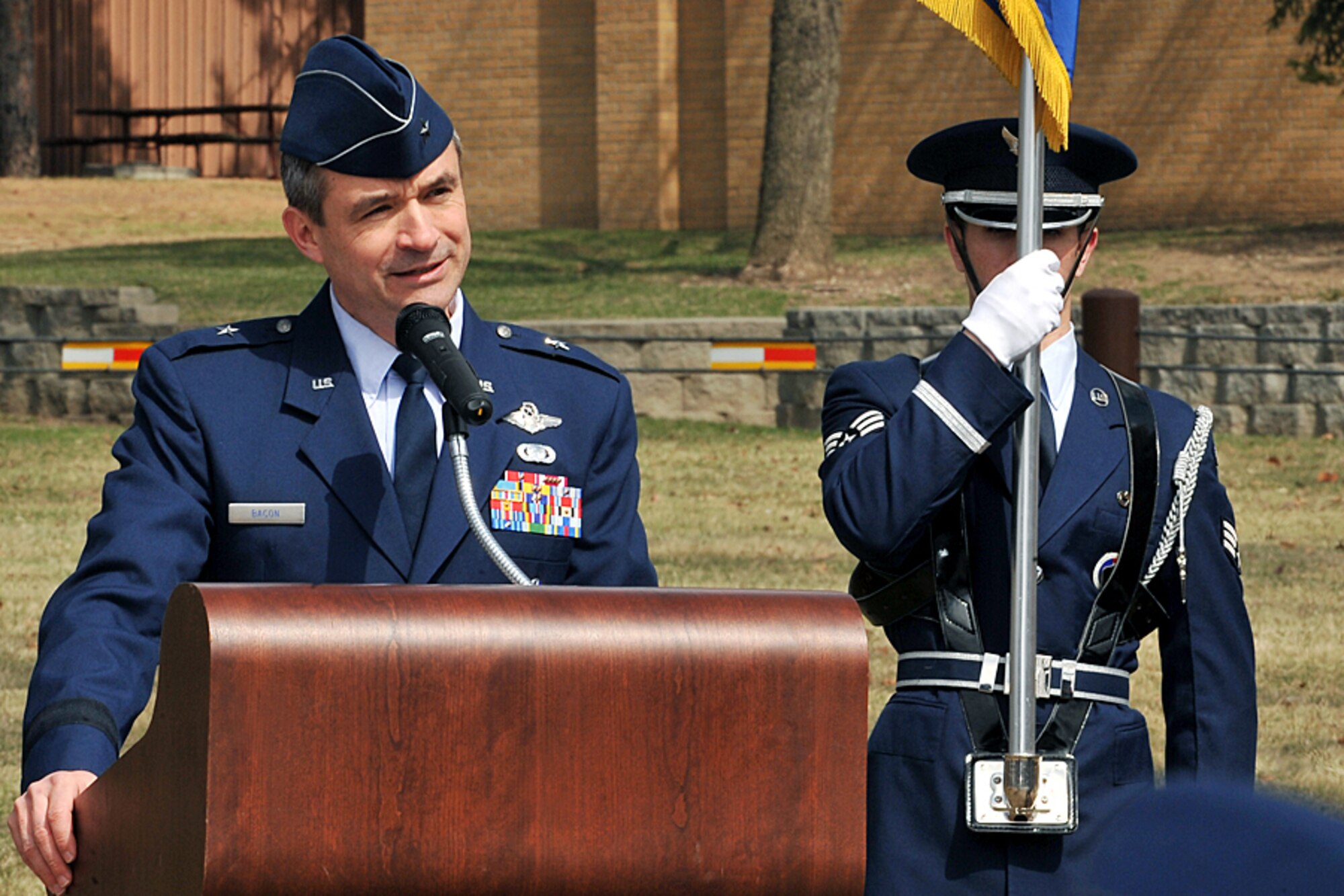OFFUTT AIR FORCE BASE, Neb. - Brig. Gen. Donald Bacon, 55th Wing commander, addresses the crowd during a road rededication ceremony held in the honor of Lt. Col. Mark Stratton II on the corner of SAC Boulevard here March 24. U.S. Air Force Photo by Charles Haymond