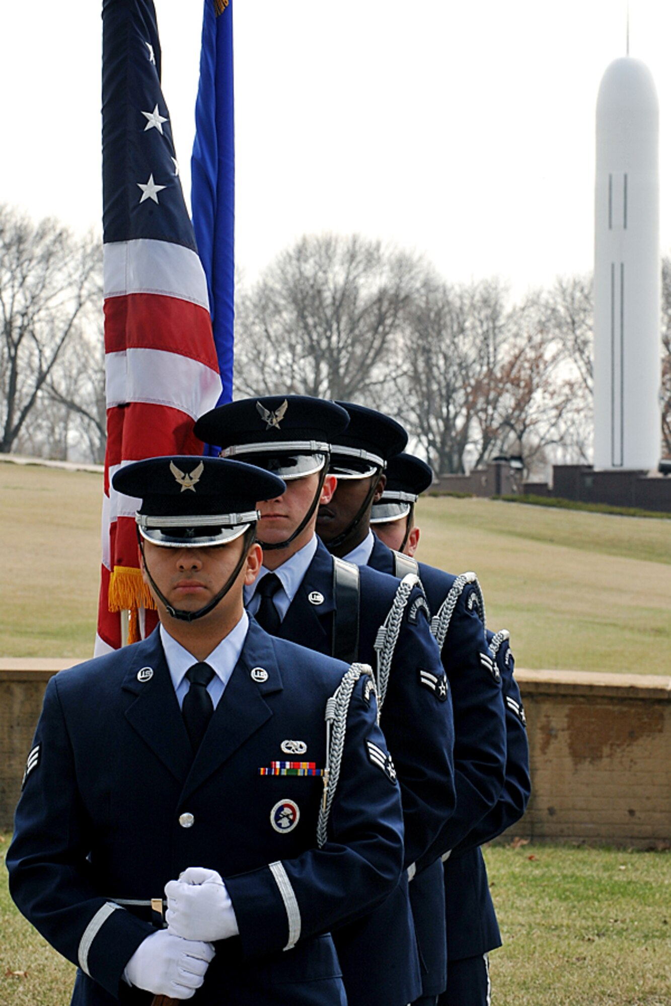 OFFUTT AIR FORCE BASE, Neb. - An Offutt Air Force Base Honor Guard team prepares to post the colors during a road rededication ceremony on the corner of SAC Boulevard and now Stratton Avenue here March 24. U.S. Air Force Photo by Charles Haymond