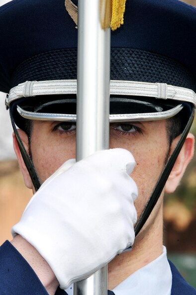 OFFUTT AIR FORCE BASE, Neb. - An Offutt Air Force Base Honor Guard team prepares to post the colors during a road rededication ceremony on the corner of SAC Boulevard and now Stratton Avenue here March 24. U.S. Air Force Photo by Charles Haymond