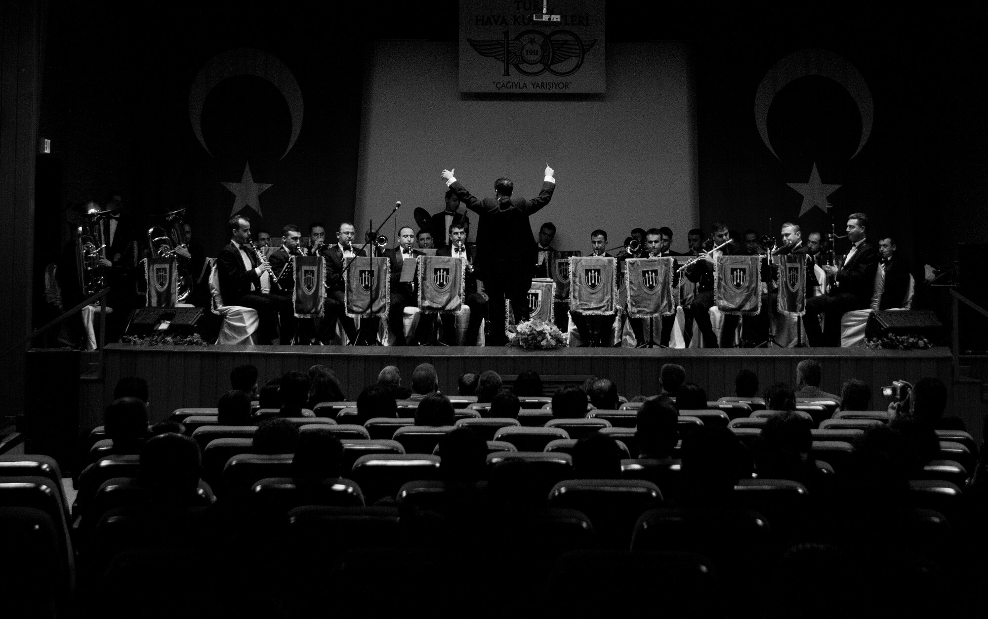 The 2nd Turkish Air Force Band performs March 10, 2011, for personnel from the 10th Tanker Command, Airmen from the 39th Air Base Wing and their families, at the base theater at Incirlik Air Base, Turkey. The 24 band members performed at several Turkish air force bases to celebrate the centennial birthday of the Turkish air force (also referred to as THK). The THK was founded in 1911 during the Ottoman Empire and is one of the oldest air forces in the world.  (U.S. Air Force photo by Staff Sgt. Alexandre Montes/Released) 