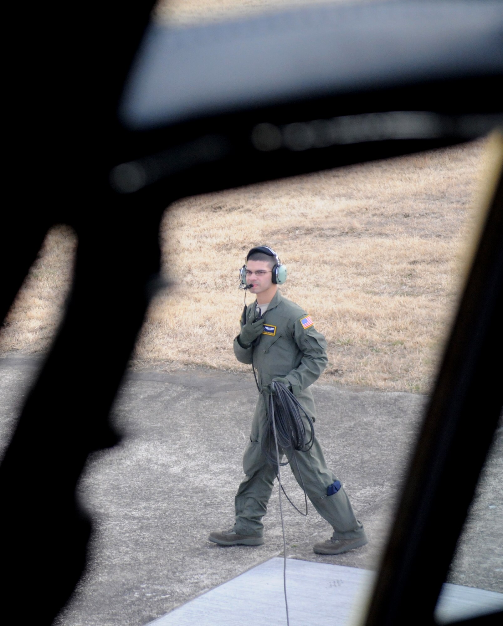 YOKOTA AIR BASE, Japan -- Airmen from the 730th  Air Mobility Squadron load cargo on to a C-130 Hercules here March 27. The supplies will be used in support for Operation Tomodachi. (U.S. Air Force photo/John D. Partlow)