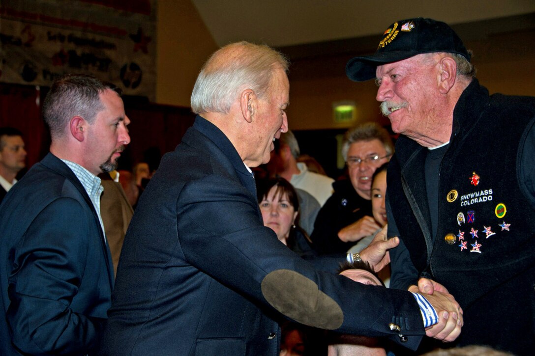 Vice President Joe Biden greets a veteran during the 25th annual National Disabled Veterans Winter Sports Clinic in Snowmass Village, Colo., March 27, 2011. 