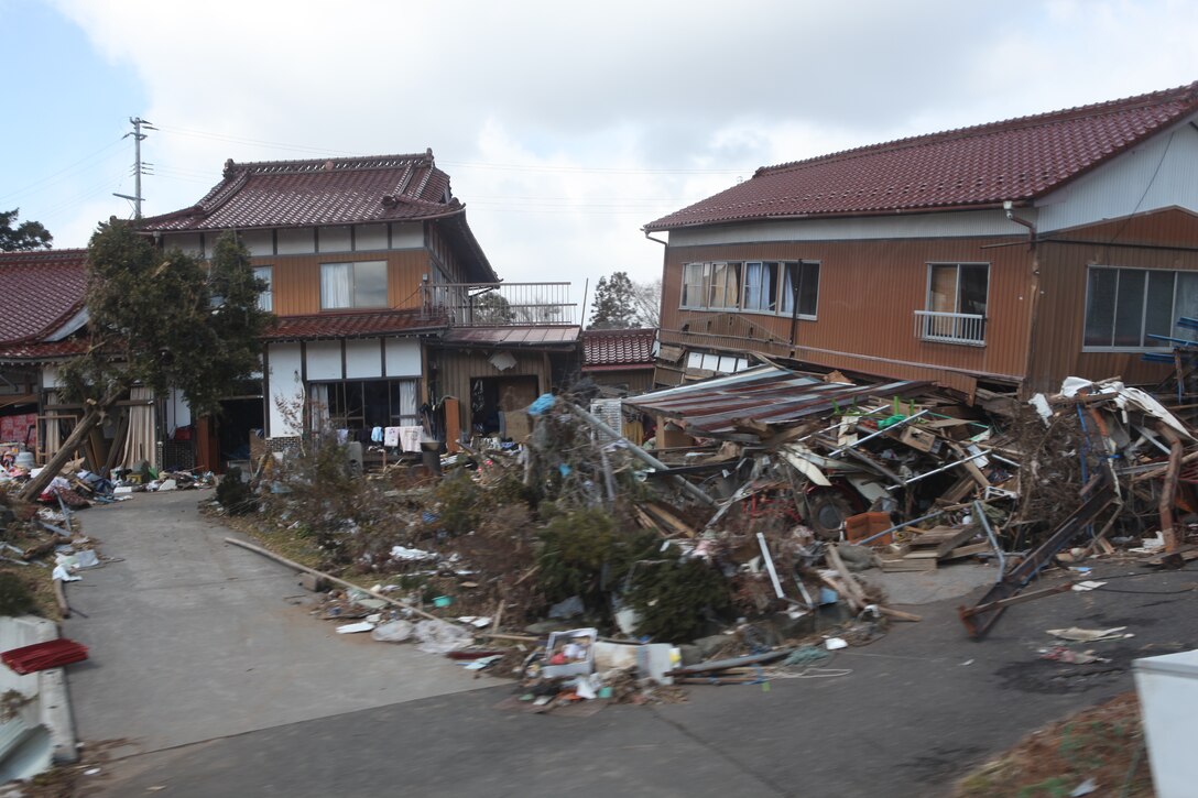 Damaged and destroyed buildings rest here after the 9.0 earthquake and following tsunami here, March 27.  The 31st MEU and Amphibous Squadron 11 picked up Japanese utility repair vehicles from the port in Kessenuma and delivered food, water, comfort items and the vehicles to residents on this isolated island.  The island of Oshima has been cut off from the mainland since the earthquake and tsunami March 11.  The operation demonstrated the MEU’s expeditionary capabilities in ship-to-shore amphibious operations. Marines and Sailors of the 31st MEU are conducting humanitarian aid and disaster relief missions in northeast Japan assisting the Japanese Self Defense Forces in their ongoing operations.