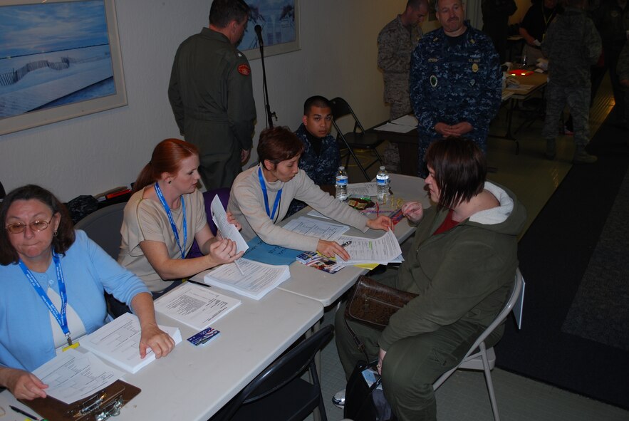 Military family members, their pets, Airmen and other service members process through Travis Air Force Base, Calif., on March 25, 2011, as part of Operation Pacific Passage. Shortly after an 8.9-magnitude earthquake and subsequent tsunami struck Japan on March 11, 2011, Department of Defense officials approved voluntary departures for DOD personnel and family members to return to the United States. U.S. Northern Command was the lead for the departure operation -- naming it "Operation Pacific Passage." According to USNORTHCOM Public Affairs, Travis AFB, Seattle-Tacoma IAP , Wash., and Denver International Airport, Colo., were the main arrival locations. (U.S. Air Force Photo)
