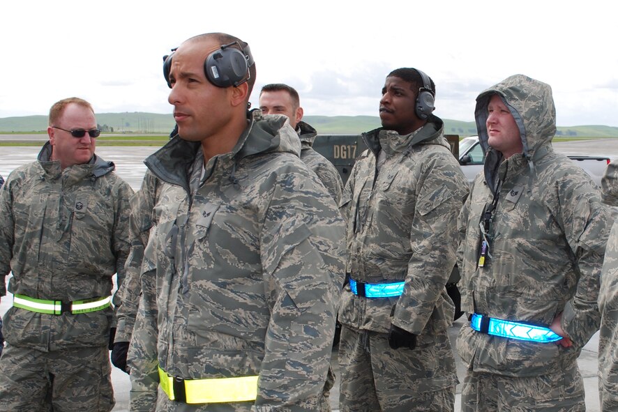 Military family members, Airmen and other service members process through Travis Air Force Base, Calif., on March 25, 2011, as part of Operation Pacific Passage. Shortly after an 8.9-magnitude earthquake and subsequent tsunami struck Japan on March 11, 2011, Department of Defense officials approved voluntary departures for DOD personnel and family members to return to the United States. U.S. Northern Command was the lead for the departure operation -- naming it "Operation Pacific Passage." According to USNORTHCOM Public Affairs, Travis AFB, Seattle-Tacoma IAP , Wash., and Denver International Airport, Colo., were the main arrival locations. (U.S. Air Force Photo)
