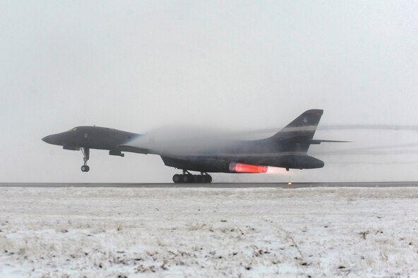 ELLSWORTH AIR FORCE BASE, S.D. -- A B-1B Lancer takes off from Ellsworth Air Force Base, S.D., in support Operation Odyssey Dawn, March 27, 2011. This mission marked the first time the B-1 fleet has launched combat sorties from the continental United States to strike targets overseas. (U.S. Air Force photo/Staff Sgt. Marc I. Lane)