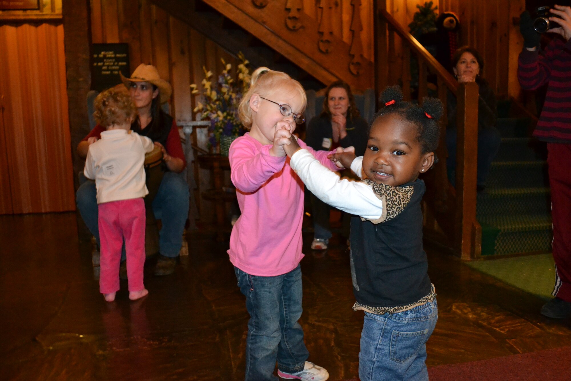 Siblings of Peterson children with special needs dance during a weekend retreat at Christ Haven Lodge in Florissant, Colo. The lodge owners invited five Peterson families with special needs children to stay at the lodge and enjoy horseback riding, swimming, and parent support groups. The retreat is for the entire family, including siblings that may not have disabilities. The lodge hosts five free weekend retreats for special needs families and worked with Peterson’s Exceptional Family Member Program coordinator Jackie Wickham, who hopes to send 40 Peterson families to the retreats throughout the year. (Courtesy photo)
