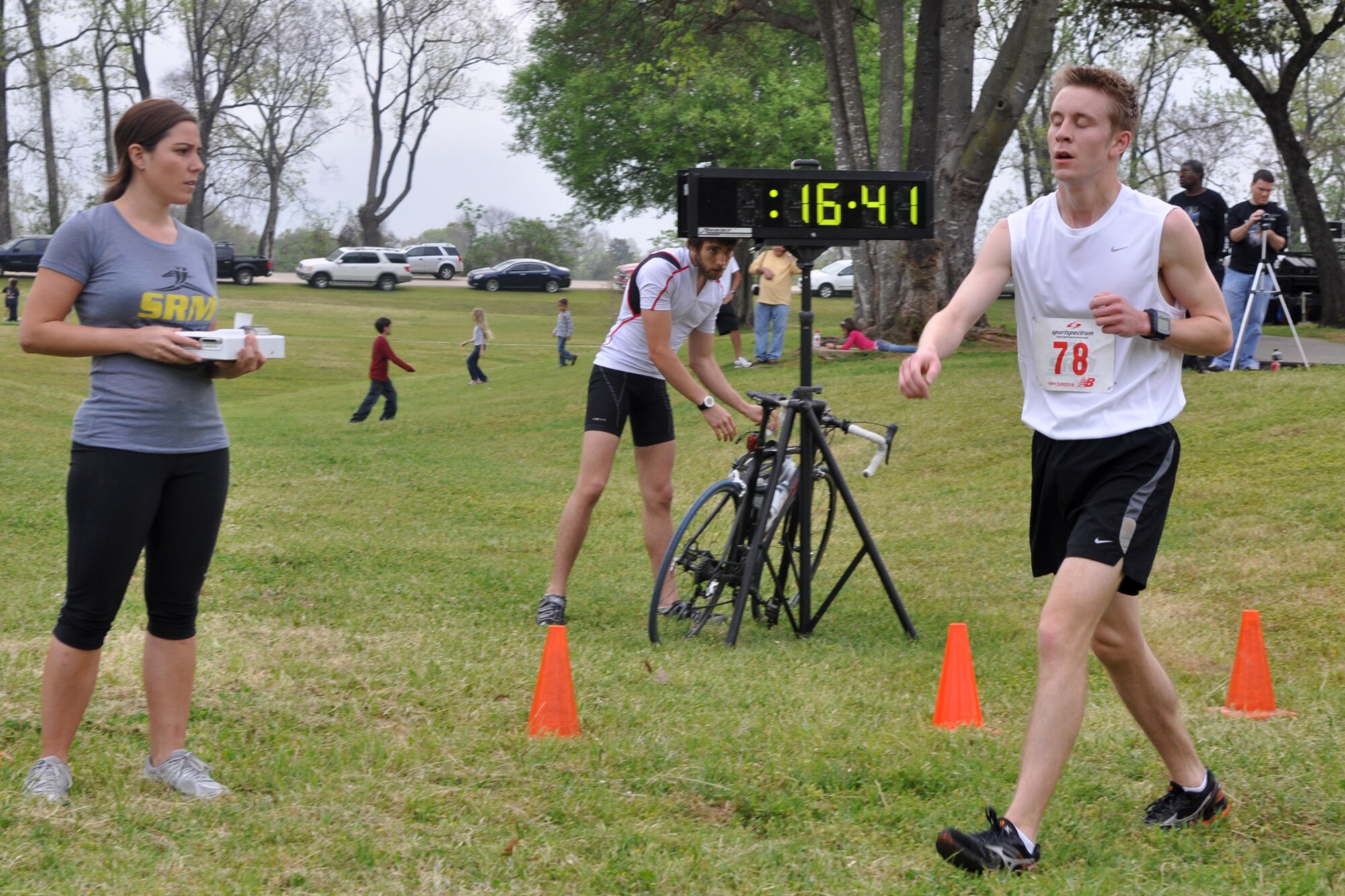 Laurie Strickland, race coordinator, logs the time as Miles McDonald, a 20-year-old student from Centenary College crosses the finish line at starts the Overton Brooks VA Medical Center’s 2nd Annual Warrior Run at Veterans Park in Shreveport, La., March 26, 2011. McDonald, who is from Shreveport was the first to cross the finish line for the 5K run. The proceeds raised at the event will support OBVAMC Voluntary Service programs such as: homeless Veteran services, rehabilitation equipment, social service assistance, comfort items, transportation, holiday gifts and other volunteer funded services. (U.S. Air Force photo/Tech. Sgt. Jeff Walston)

