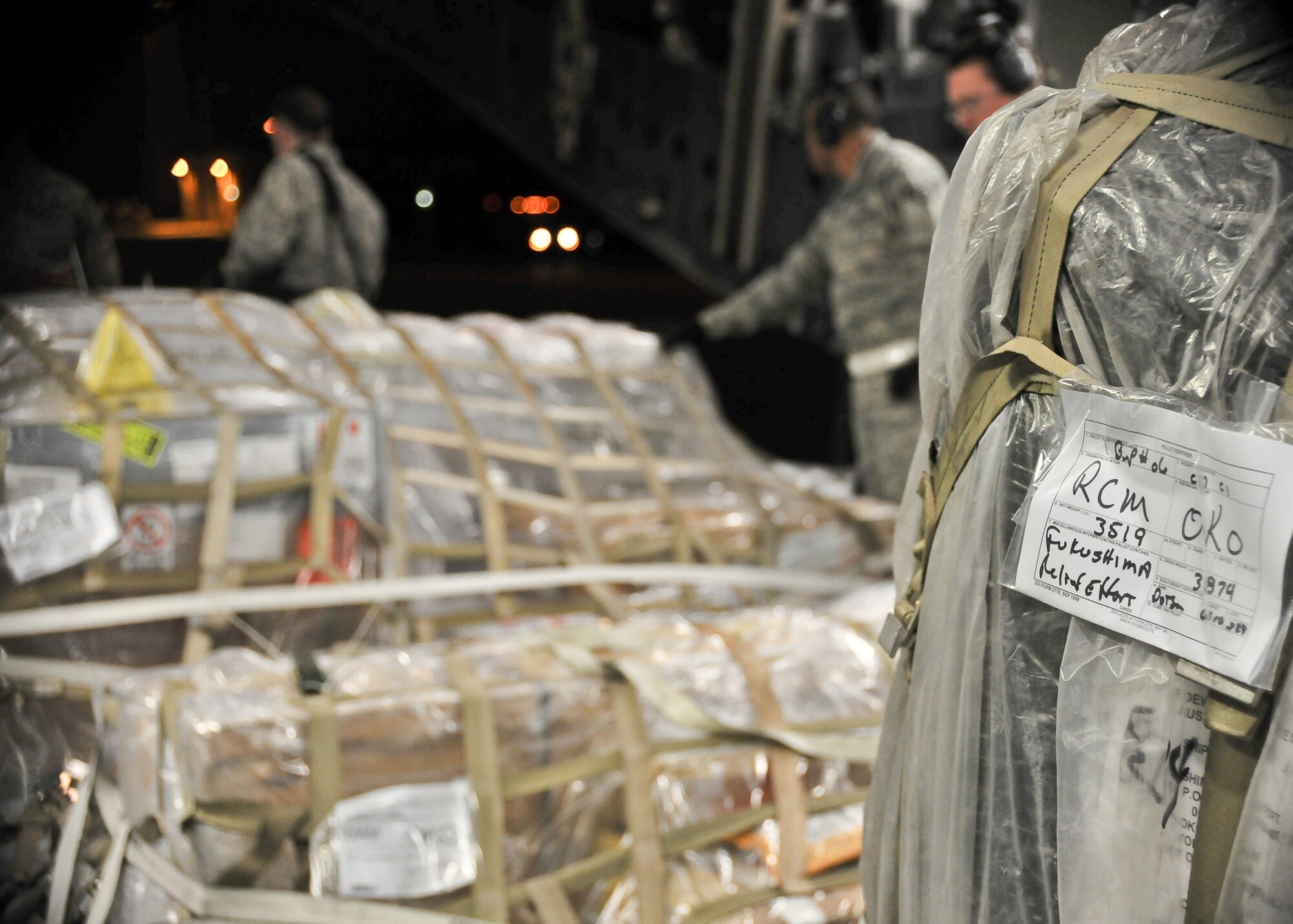 YOKOTA AIR BASE, Japan -- A C-17 Globemaster III carrying water pumps and hoses donated by the US government arrives here March 30, 2011. The aircraft delivered 20,000 pounds of cooling equipment to help the Japanese government stabilize the Fukushima nuclear power plant. The 374th Contracting Squadron has worked around the clock with the U.S. Government to have these supplies purchased in support of Operation Tomodachi. (U.S. Air Force photo/Airman 1st Class Andrea Salazar)