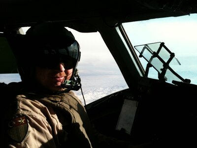Maj. Roy Bentley at the controls of a C-17 during his latest deployment. (U.S. Air Force photo)