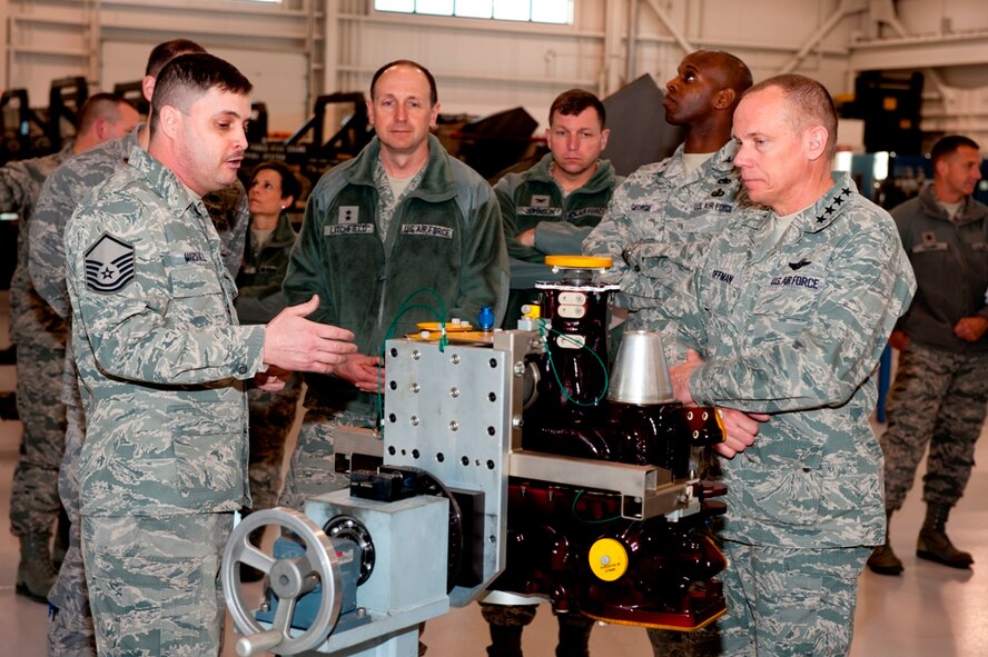 Master Sgt. William Marshal, of the 3rd Component Maintenance Squadron, briefs Gen. Donald Hoffman on the permanent magnetic generator bearing failures, what the squadron is doing to mitigate failures, and future re-design specifications during the general’s visit March 7, 2011. Gen. Donald Hoffman, commander of Air Force Materiel Command, visited Joint Base Elmendorf-Richardson as part of a trip through select Pacific Air Forces bases and the U.S. Central Command's area of responsibility. General Hoffman is making this trip to acquire feedback directly from warfighters to determine how the command can better accomplish its supply and sustainment operations. (U.S. Air Force photo/Johnathon Green)