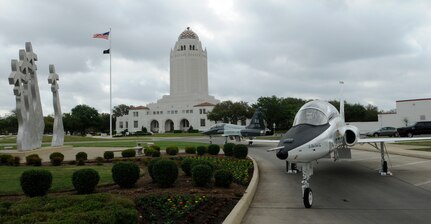 T-38 "White Rocket ' is on display in front of the 12th Flying Training Wing Headquarters ( Known as the Taj) on Randolph Air Force Base, Texas.  The T-38 was on display in celebration of the Freedom Flyers wreath laying ceremony, March 25. (U.S. Air Force Photo By Don Lindsey)