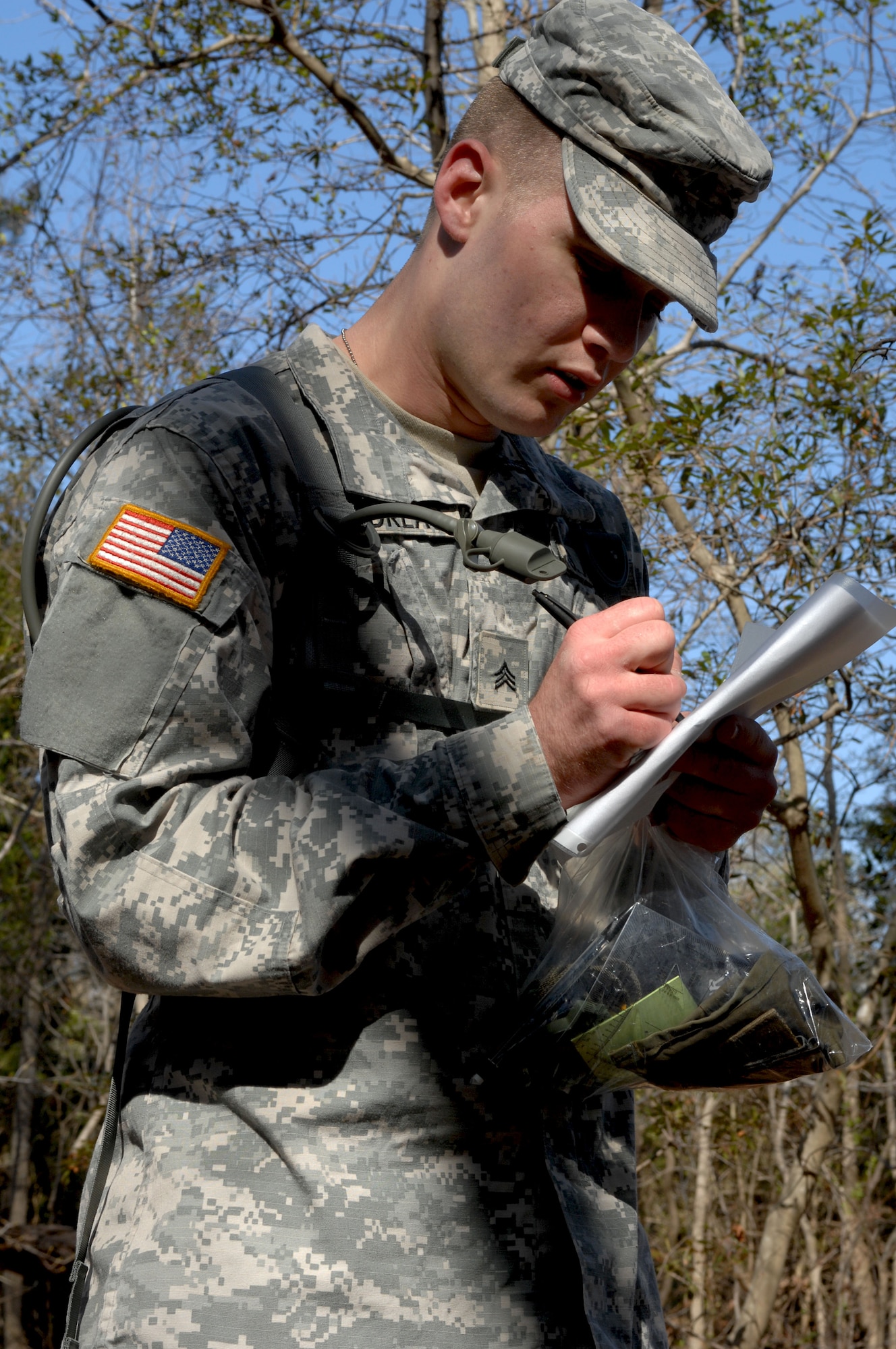 110325-F-JC454-001: Army Sgt. Kenneth Gaudreau, drill sergeant candidate with 2nd Battalion, 317th Regiment, configures coordinates before the land navigation portion of the Best Warrior competition at Fort Eustis, Va., March 25, 2011. Soldiers from various bases tested their physical and mental capabilities in combat environments to strive or the title Best Warrior in their division. (U.S. Air Force photo by Airman 1st Class Teresa Zimmerman/Released)