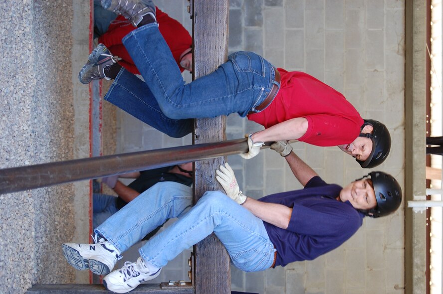 Employers work together during the mentally, and physically, challenging Project X. Project X is meant to teach military leaders how to problem-solve under time and resource constraints. (USAF photo by Maj. Shannon Mann, 916ARW/PA)