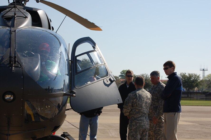 Employers get to look at the Alabama Army National Guard's newest helicopter during a two-day bosslift to Maxwell Air Force Base, Ala. (USAF photo by Maj. Shannon Mann, 916ARW/PA)