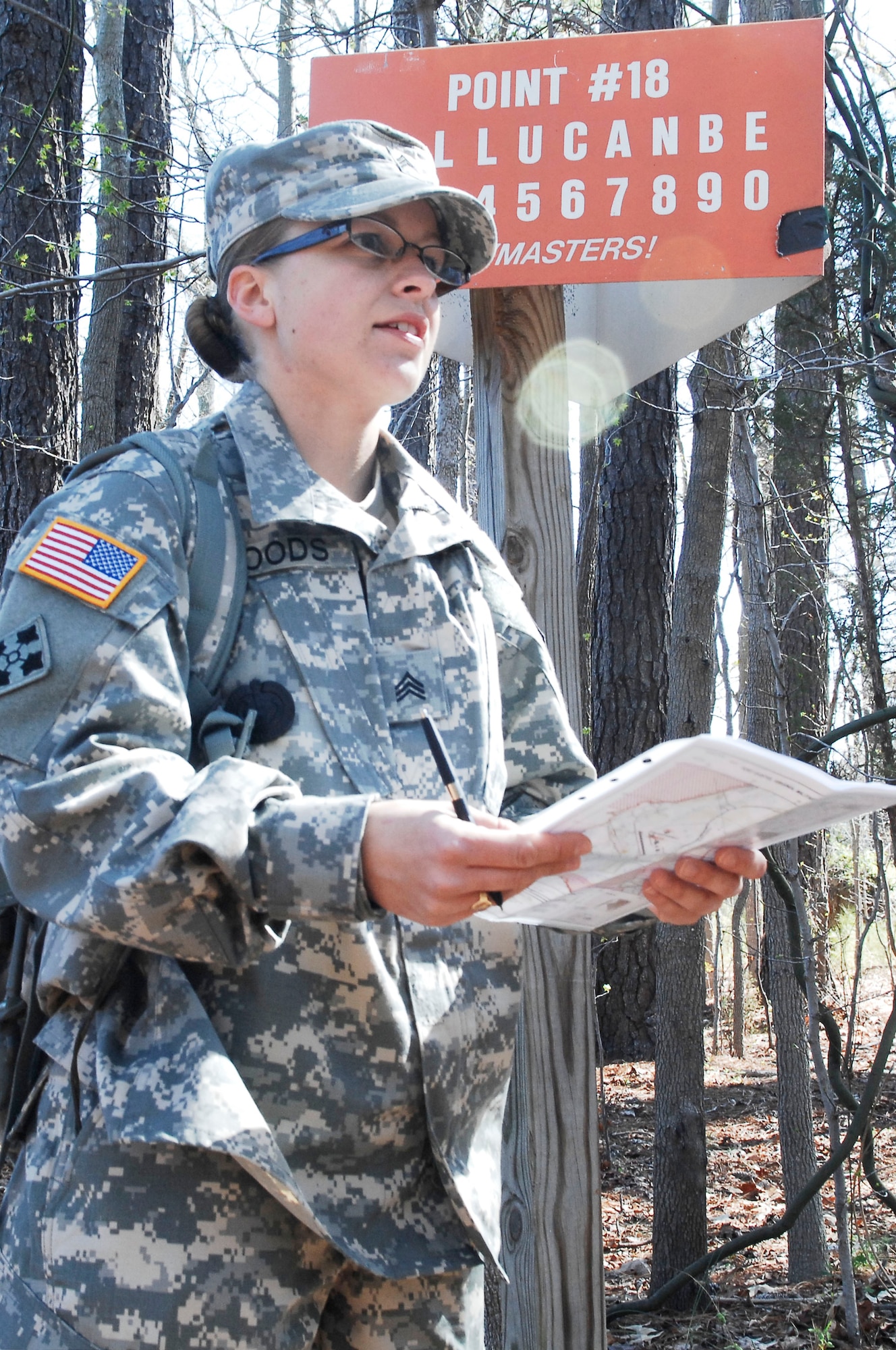 Army Sgt. Sarah Woods, drill sergeant candidate with Charlie Company, 2nd Battalion, 417th Regiment, participates in the land navigation portion of the Best Warrior competition at Fort Eustis, Va., March 25, 2011.  Soldiers from various bases displayed their mental and physical capabilities to win Best Warrior in their division. (U.S. Air Force photo by Airman 1st Class Kayla Newman/Released)
