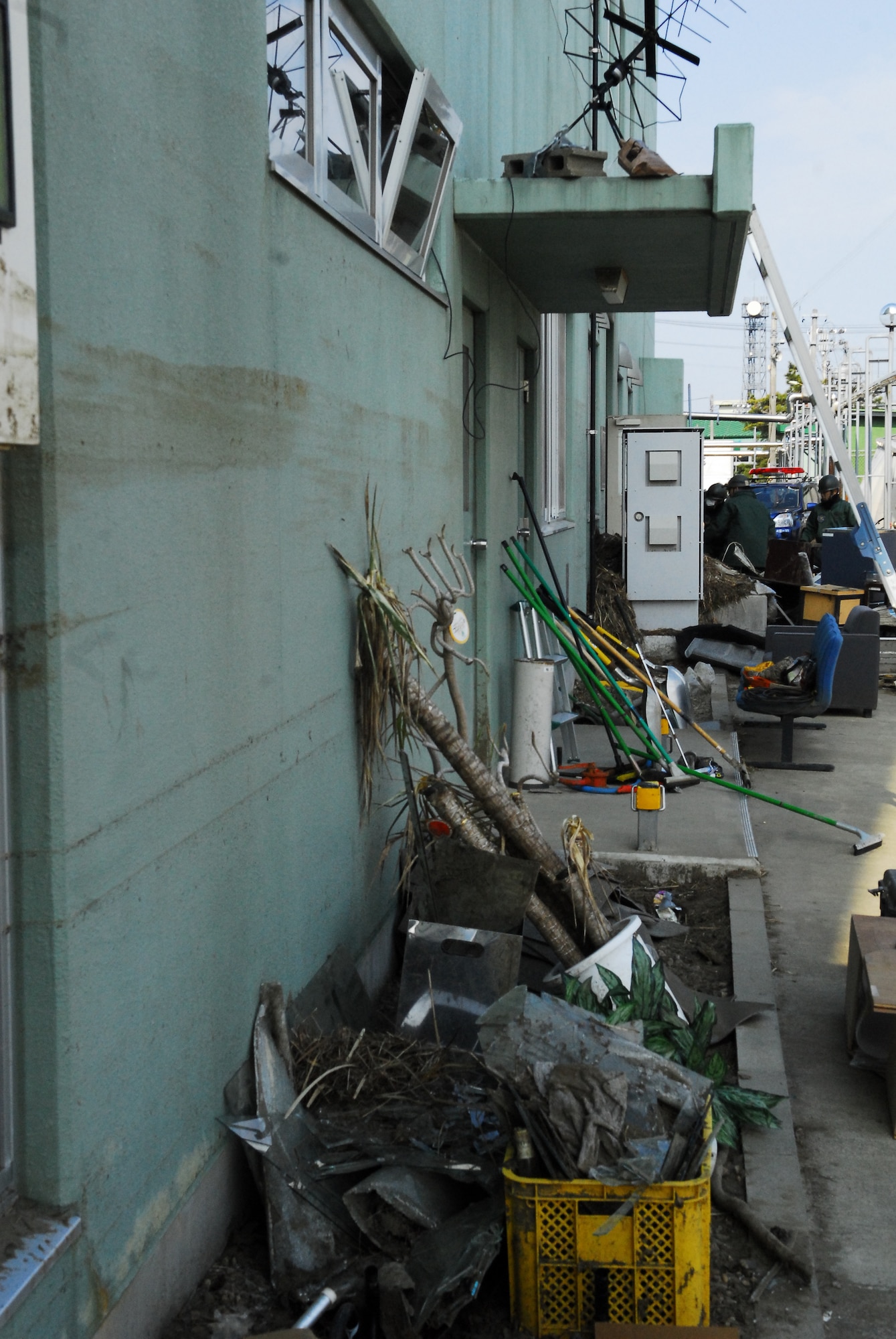 MATSUSHIMA AIR BASE, Japan -- Water level marks can still be seen on buildings surrounding Matsushima Air Base, March 29, nearly two weeks after an earthquake and tsunami struck the area. Members from the 36th Airlift Squadron, Yokota Air Base, Japan, were on scene to deliver more than 11,000 pounds of relief supplies to support the Government of Japan's request for humanitarian assistance. (U.S. Air Force photo/Staff Sgt. Robin Stanchak)