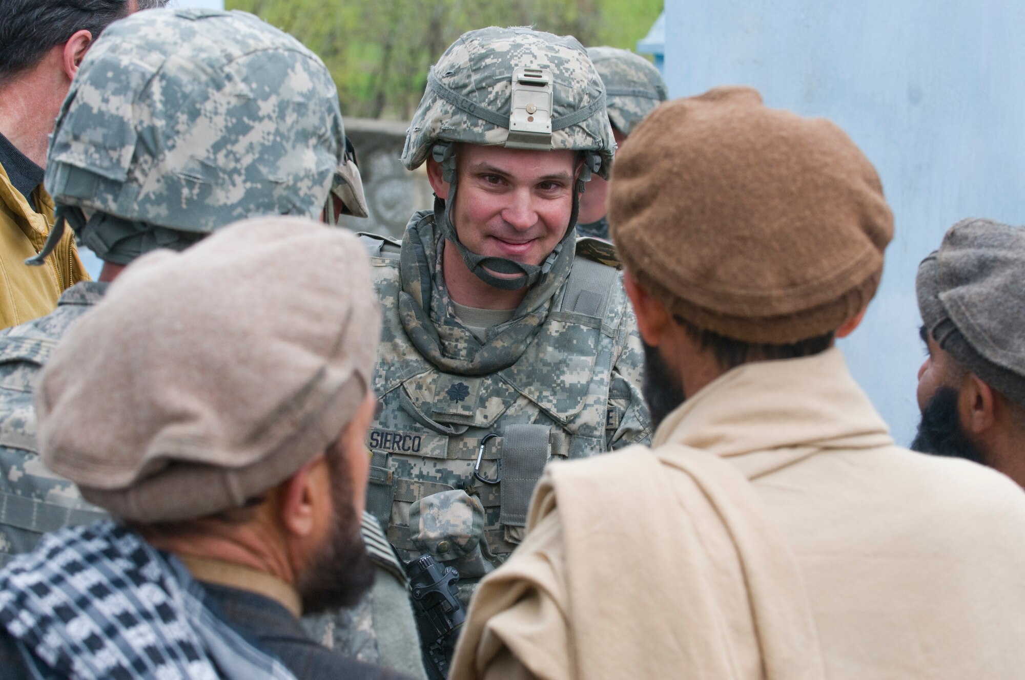 KAPISA PROVINCE, Afghanistan – U.S. Air Force Lt. Col. Michael Sierco, Kapisa Provincial Reconstruction Team commander from Bowie, Md., speaks to school officials at the ribbon cutting ceremony for the newly constructed Kohi Girl’s School in Afghanya here, March, 28. The girl’s school was built to accommodate more than 400 female students from the Afghanya valley. The mission of Kapisa PRT is to help facilitate the local and national governments of Afghanistan working together to help provide for the development and security needs of the Afghan people.  (Photo by U.S. Air Force Staff Sgt. Kyle Brasier, Kapisa Provincial Reconstruction Team Public Affairs / released)
