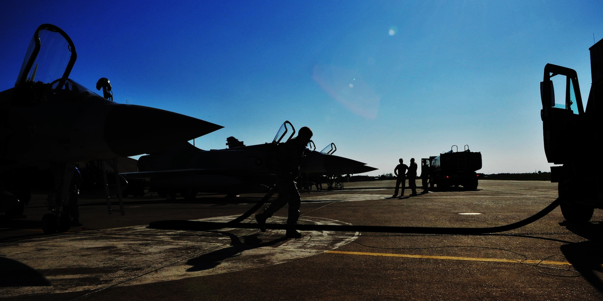 Senior Airman Kevin Kloss, of the 39th Logistics Readiness Squadron, finishes refueling Qatari aircraft in support of Operation Odyssey Dawn March 25, 2011, at Incirlik Air Base, Turkey.  Joint Task Force Odyssey Dawn is the U.S. Africa Command task force established to provide operational and tactical command and control of U.S. military forces supporting the international response to the unrest in Libya and enforcement of United Nations Security Council Resolution 1973. UNSCR 1973 authorized all necessary measures to protect civilians in Libya under threat of attack by Qadhafi regime forces. JTF Odyssey Dawn is commanded by U.S. Navy Admiral Samuel J. Locklear, III. (U.S. Air Force photo by Staff Sgt. Alexandre Montes)