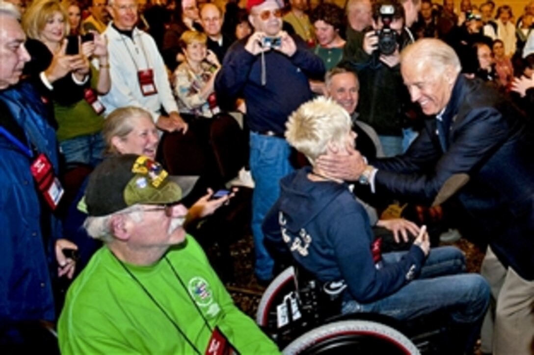 Vice President Joe Biden greets a veteran during the 25th annual National Disabled Veterans Winter Sports Clinic in Snowmass Village, Colo., March 27, 2011.