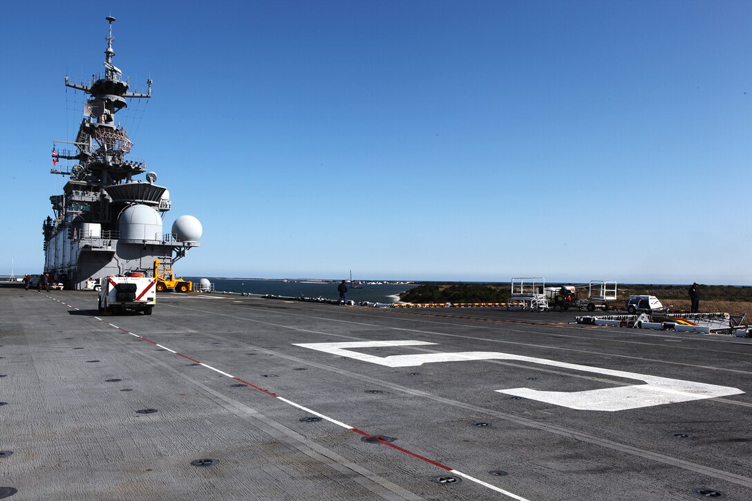 USS Bataan pushes away from the Morehead City State Port, March 28, 2011.  The 22nd MEU is currently conducting pre-deployment training exercises with Amphibious Squadron 6, and is embarked aboard the USS BATAAN Amphibious Ready Group.  The 22nd MEU is a multi-mission capable Marine Air Ground Task Force comprised of Aviation Combat Element, Marine Medium Tilt Rotor Squadron 263 (Reinforced); Logistics Combat Element, Combat Logistics Battalion 22; Ground Combat Element, Battalion Landing Team, 2nd Battalion, 2nd Marine Regiment; and its command element.