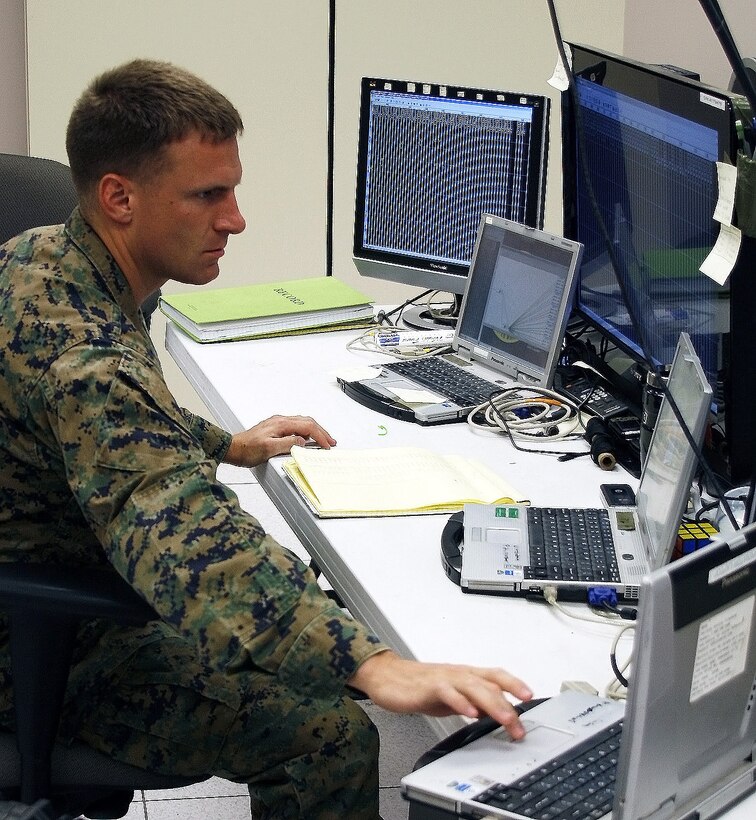 Lance Cpl. Clay Smith, Ground Sensor Platoon,  2nd Intelligence Battalion, monitors sensor activations at the tactical command center.  All suspected illegal activities detected by the Marines were reported to the U.S. Border Patrol agents patrolling the U.S. – Mexico border area in South Texas.