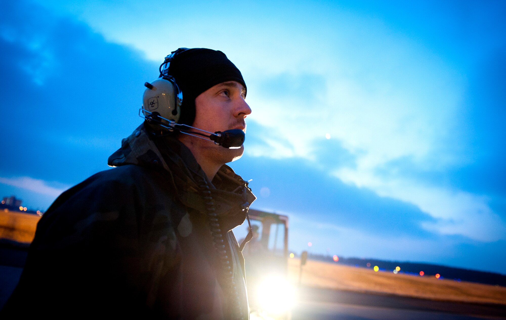 YOKOTA AIR BASE, Japan -- Staff Sgt. Owen Connolly, 353rd Special Operations Maintenance Squadron aerospace maintenance crew chief, speaks to the crew chief in the cockpit of an MC-130P Combat Shadow prior to taxiing down the flight line here March 31. As part of Operation Tomodachi, the U.S. military has humanitarian assistance capabilities positioned in the affected region that are supporting emergency relief efforts and trying to minimize human suffering. U.S. military assets include a wide range of equipment and air, sea and ground capabilities and expertise. (U.S. Air Force photo/Staff Sgt. Chad C. Strohmeyer)