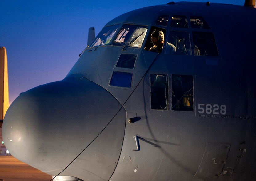 YOKOTA AIR BASE, Japan -- Staff Sgt. Jack Kindell, 353rd Special Operations Maintenance Squadron aerospace maintenance crew chief, sits in the cockpit of an MC-130P Combat Shadow here March 31. As part of Operation Tomodachi, the U.S. military has humanitarian assistance capabilities positioned in the affected region that are supporting emergency relief efforts and trying to minimize human suffering. U.S. military assets include a wide range of equipment and air, sea and ground capabilities and expertise. (U.S. Air Force photo/Staff Sgt. Chad C. Strohmeyer)