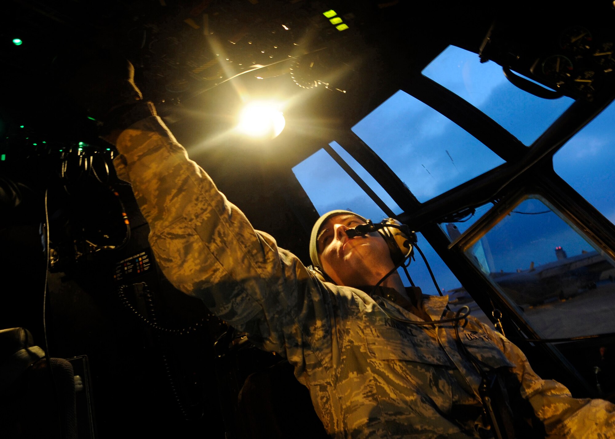 YOKOTA AIR BASE, Japan -- Staff Sgt. Jack Kindell, 353rd Special Operations Maintenance Squadron crew chief, prepares an MC-130P Combat Shadow to be moved across the flight line here March 31, 2011. There are currently four MC-130Ps deployed to Yokota to assist with Operation Tomodachi. As part of Operation Tomodachi, the U.S. military has humanitarian assistance capabilities positioned in the affected region that are supporting emergency relief efforts and trying to minimize human suffering.  U.S. military assets include a wide range of equipment and air, sea and ground capabilities and expertise. (U.S. Air Force photo/Airman 1st Class Andrea Salazar)