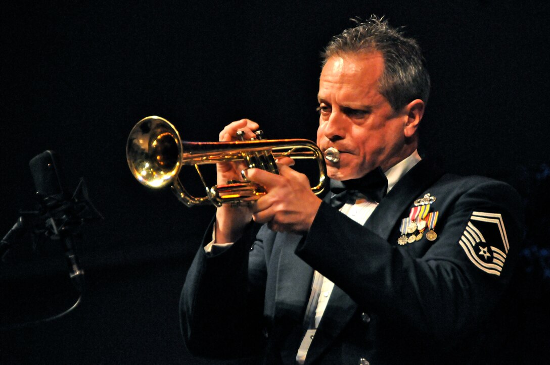 Senior Master Sgt. Kevin R. Burns, split lead trumpeter with the Airmen of Note, the premier jazz ensemble of The U.S. Air Force Band, performs solo March 26 at the Connor Performing Arts Center in Little Rock, Ark. The Note traveled through Virginia, Tennessee, Mississippi and Arkansas on it’s 2011 Spring Tour. (U.S. Air Force photo by Airman 1st Class Tabitha N. Haynes)