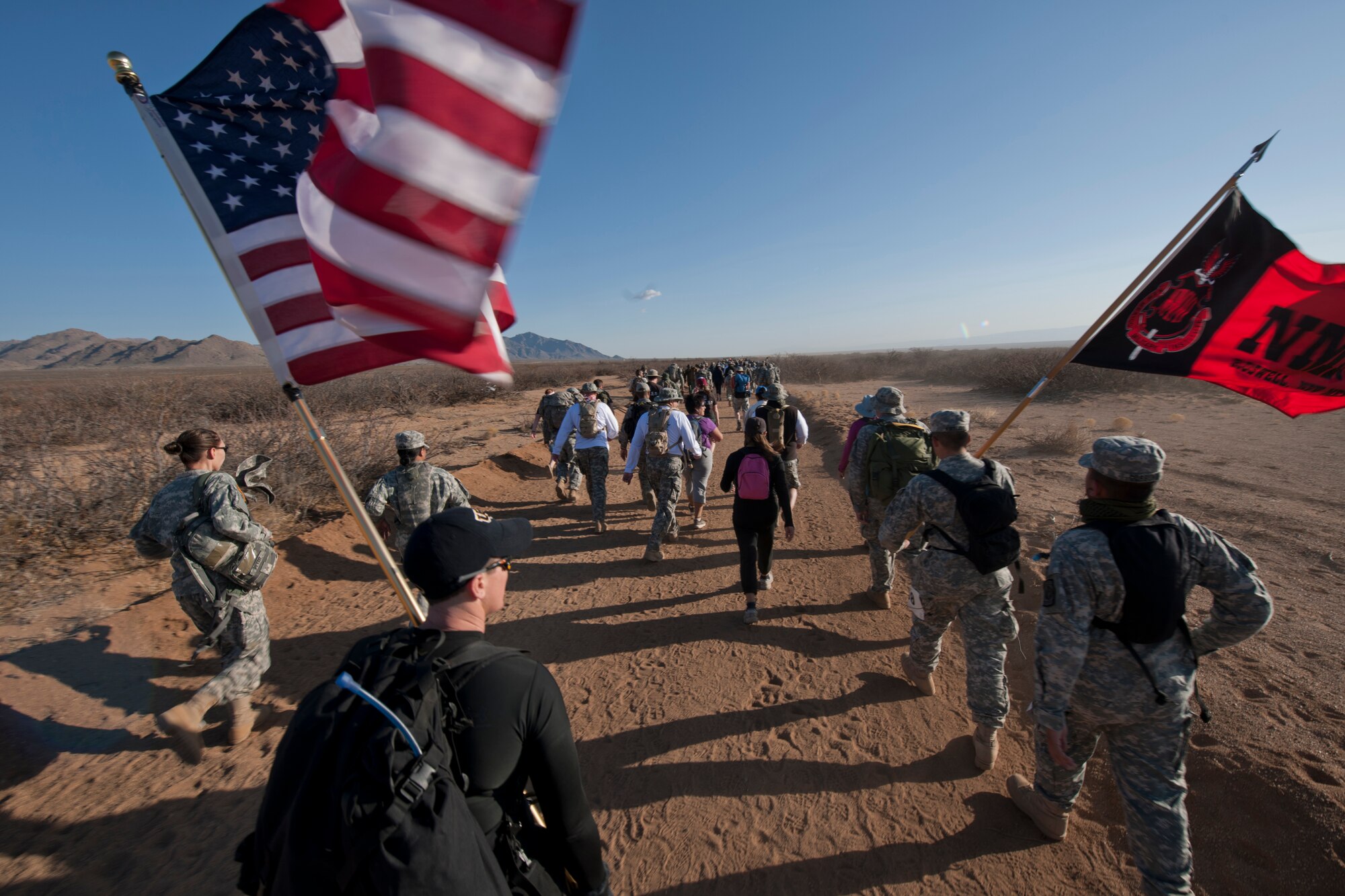 WHITE SANDS MISSLE RANGE, N.M. -- Participants of the 22nd Annual Bataan Memorial Death March trek through the 26.2-mile desert trail March 27, 2011. The event, attended by a record number of more than 6,000 marchers, commemorates the original Bataan Death March which occurred in the Philippines during World War II. (U.S. Air Force photo by Airman 1st Class Joshua Turner/Released)