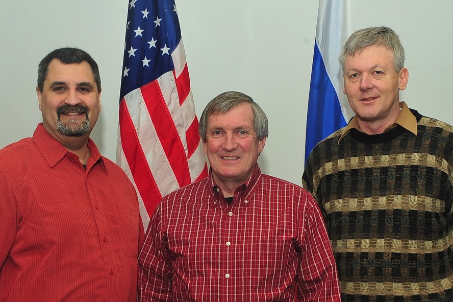 MINOT AIR FORCE BASE, N.D. -- (Left to Right) Mr. Dennis Mikula, Mr. Pat Travnicek, and Mr. Dave Bucknall, all part of the Minot Treaty Compliance Office here, make up the team responsible for ensuring the Minot Air Force Base complies with specific treaty obligations that affect base activities and operations for the 5th Bomb Wing and the 91st Missile Wing. The office's three-person team also keeps bombers and missiles here ready for foreign country inspections. (U.S. Air Force photo/Senior Airman Jesse Lopez)