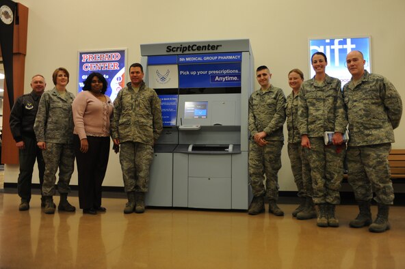 MINOT AIR FORCE BASE N.D.-- Members of the 5th Medical Group along with base leadership inaugurated a state-of-the-art ScriptCenter pharmacy refill kiosk at the Exchange here March 30. If needed patients can expect to pick up refills at this kiosk, offering greater convenience and flexibility. (U.S. Air Force photo/Airman 1st Class Aaron-Forest Wainwright)

