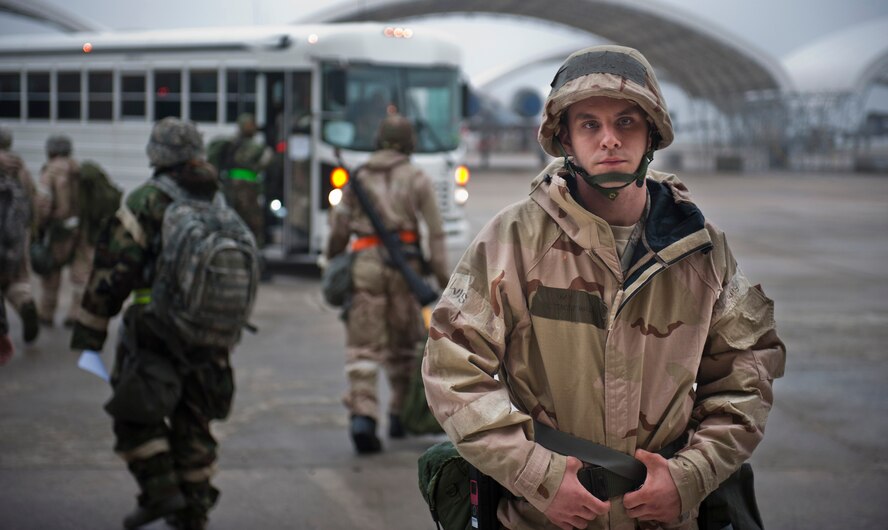Airman 1st Class Timothy Hagler, 23rd Component Maintenance Squadron aircraft fuels systems journeyman, waits for co-workers outside an exercise entry point March 30 at Moody Air Force Base, Ga. At the EEP, Airmen are told of any pertinent exercise information for the day and can check their gear before entering the play area. (U.S. Air Force photo/Staff Sgt. Jamal D. Sutter)(RELEASED)