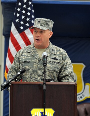 Col. Erik Hansen speaks before military and community members for the first time as commander of the 437th Airlift Wing March 29 on Joint Base Charleston, S.C. Colonel Hansen closed his speech by saying, "I am proud to be an Airman. I am proud to be in the Air Force and I am proud to be in Charleston." (U.S. Air Force photo/Senior Airman Timothy Taylor)