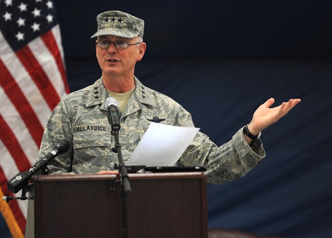 Lt. Gen. Robert Allardice highlights the accomplishments of Team Charleston during Col. John Wood's tenure at the 437th Airlift Wing Change of Command March 29 on Joint Base Charleston, S.C. General Allardice was the presiding officer for the change of command and is the commander of the 18th Air Force. (U.S. Air Force photo/Senior Airman Timothy Taylor)
